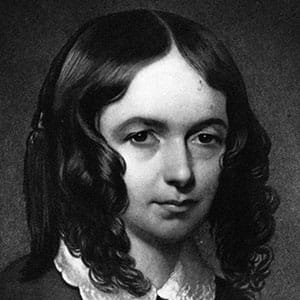 A black-and-white portrait of a woman with long dark ringlets and a white lace collar.